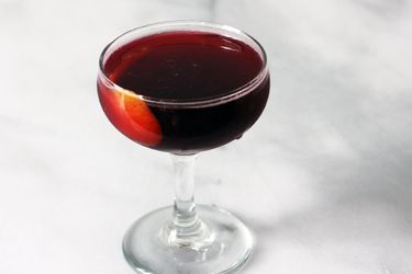 Scotch, sherry, and concord cocktail