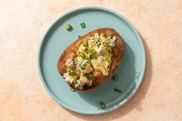 Vegan cheesy baked potatoes with broccoli