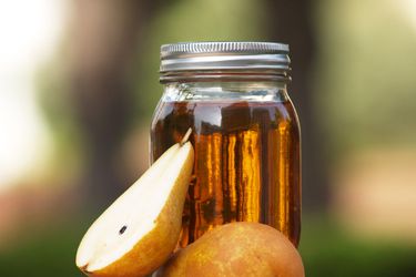 Mason jar of DIY pear liqueur