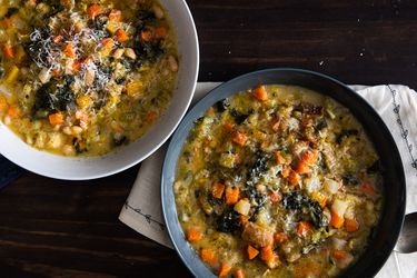 Overhead view of two bowls filled with ribollita soup.